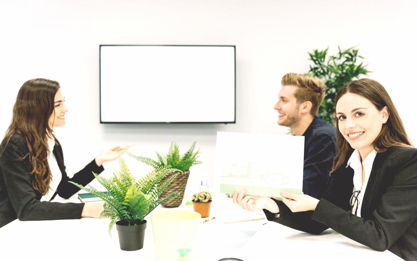 People learning practical budget management techniques in collaborative setting