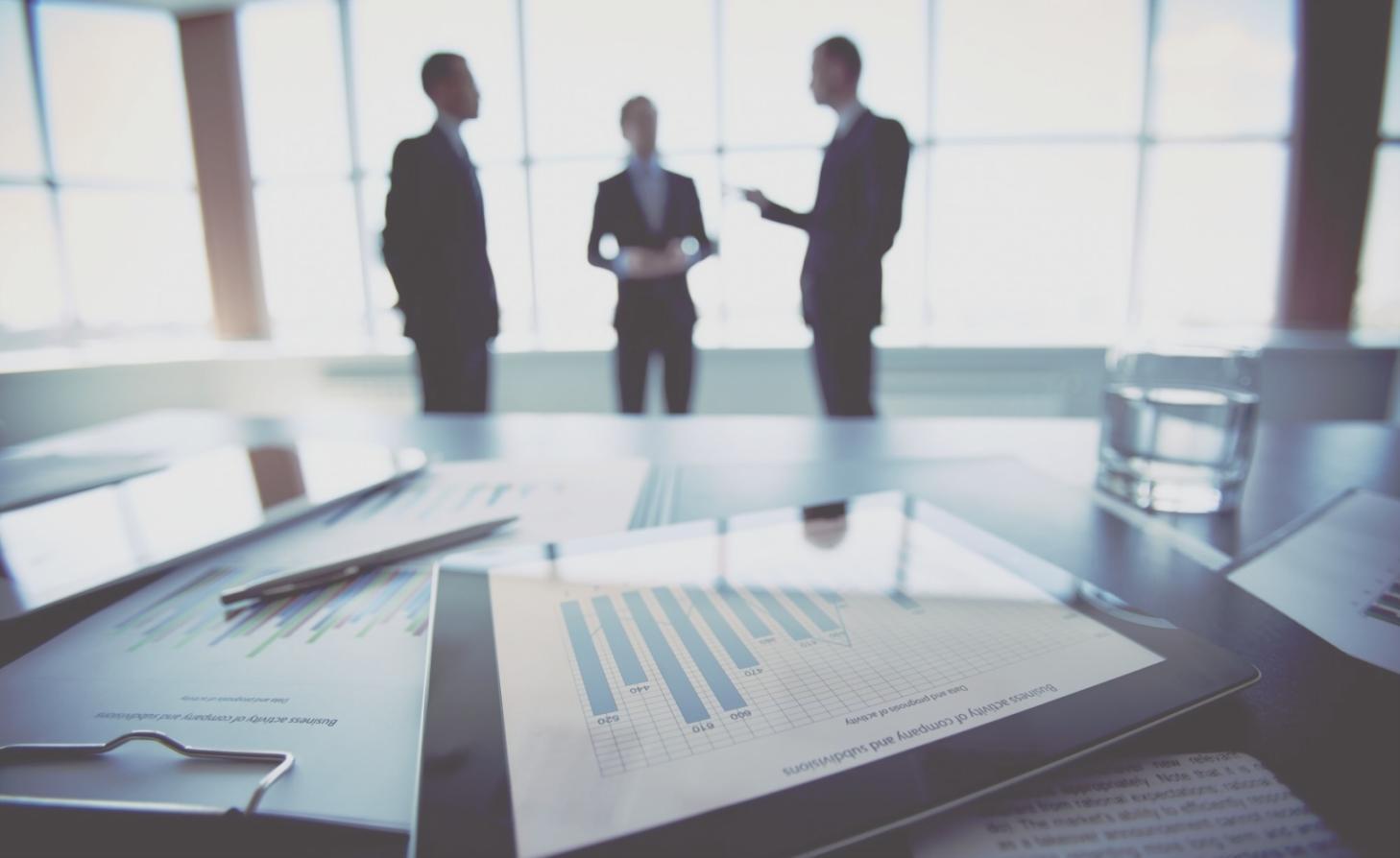 Modern workspace with financial planning materials